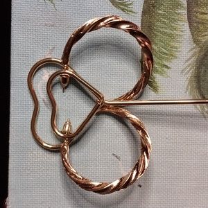 Gold tone twisted hoop pierced earrings